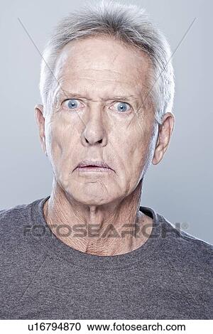 Portrait of shocked senior man, studio shot View Large Photo Image Stock Image - Portrait of shocked senior man, studio shot. Fotosearch