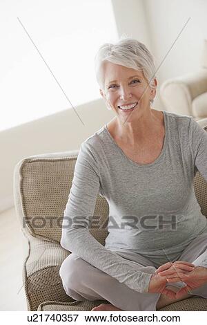 Portrait of smiling senior woman View Large Photo Image Stock Photo - Portrait of smiling senior woman. Fotosearch