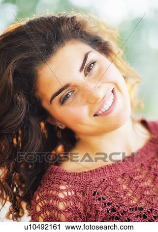 Portrait of smiling woman in backlit View Large Photo Image Stock Image - Portrait of smiling woman in backlit. Fotosearch