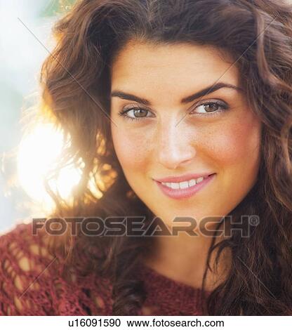 Portrait of smiling woman in backlit View Large Photo Image Stock Image - Portrait of smiling woman in backlit. Fotosearch