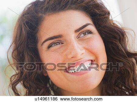 Stock Photograph - Portrait of smiling woman . Fotosearch