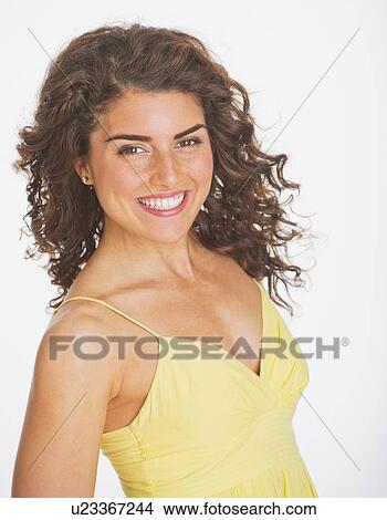Picture - Portrait of smiling woman, studio shot. Fotosearch