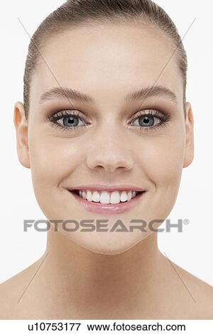 Portrait of smiling young woman View Large Photo Image Stock Photo - Portrait of smiling young woman. Fotosearch