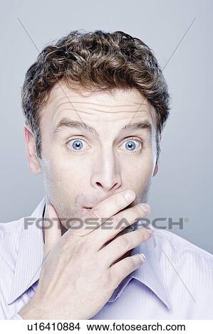 Portrait of surprised mid adult man, studio shot View Large Photo Image Picture - Portrait of surprised mid adult man, studio shot. Fotosearch