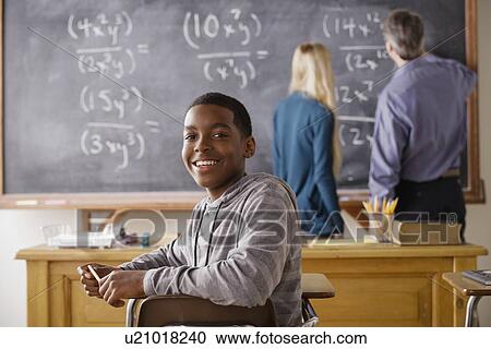 Portrait of teenage boy (14-15) at school View Large Photo Image Stock Image - Portrait of teenage boy (14-15) at school. Fotosearch