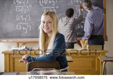 Portrait of teenage girl (14-15) at school View Large Photo Image Stock Photography - Portrait of teenage girl (14-15) at school. Fotosearch