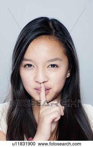 Portrait of teenage girl (14-15), studio shot View Large Photo Image Stock Image - Portrait of teenage girl (14-15), studio shot. Fotosearch