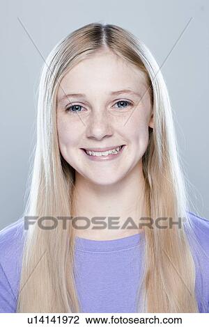 Portrait of teenage girl (14-15), studio shot View Large Photo Image Stock Image - Portrait of teenage girl (14-15), studio shot. Fotosearch