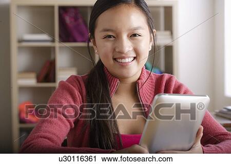 Portrait of teenage girl (14-15) View Large Photo Image Stock Image - Portrait of teenage girl (14-15). Fotosearch