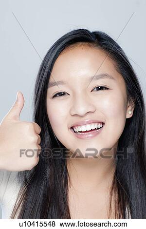 Portrait of teenage girl (14-15), studio shot View Large Photo Image Stock Photo - Portrait of teenage girl (14-15), studio shot. Fotosearch