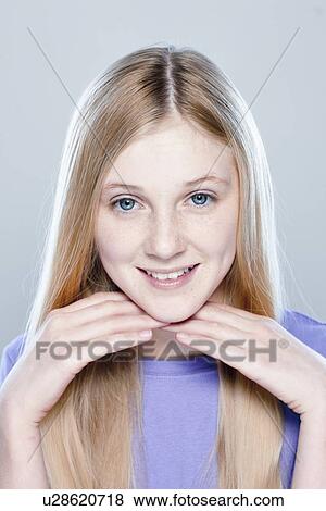 Portrait of teenage girl (14-15), studio shot View Large Photo Image Stock Photo - Portrait of teenage girl (14-15), studio shot. Fotosearch