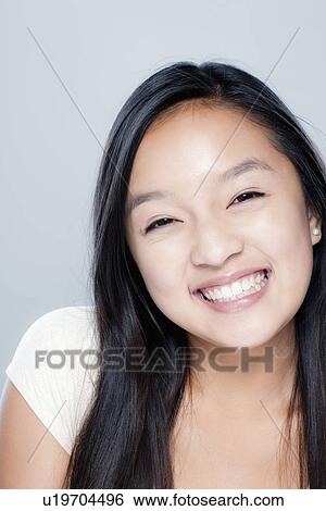 Portrait of teenage girl (14-15), studio shot View Large Photo Image Stock Photograph - Portrait of teenage girl (14-15), studio shot. Fotosearch