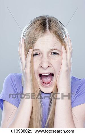 Portrait of teenage girl (14-15), studio shot View Large Photo Image Stock Photography - Portrait of teenage girl (14-15), studio shot. Fotosearch
