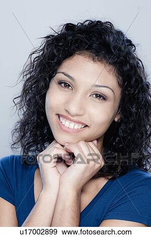 Portrait of teenage girl (16-17), studio shot View Large Photo Image Stock Photo - Portrait of teenage girl (16-17), studio shot. Fotosearch