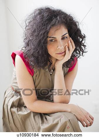Portrait of thoughtful young woman View Large Photo Image Picture - Portrait of thoughtful young woman. Fotosearch