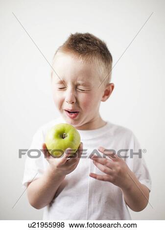 Portrait of toddler boy (2-3) playing with green apple View Large Photo Image Stock Photo - Portrait of toddler boy (2-3) playing with green apple. Fotosearch
