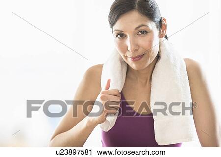 Portrait of woman with towel View Large Photo Image Stock Image - Portrait of woman with towel. Fotosearch