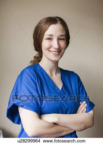 Picture - Portrait of young attractive female nurse. Fotosearch