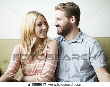 Stock Photo - Portrait of young couple . Fotosearch