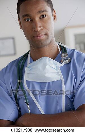Portrait of young doctor View Large Photo Image Stock Photo - Portrait of young doctor. Fotosearch