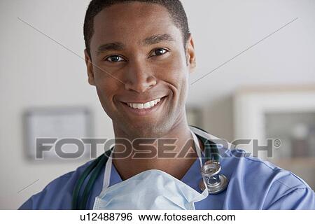 Stock Photograph - Portrait of young doctor. Fotosearch