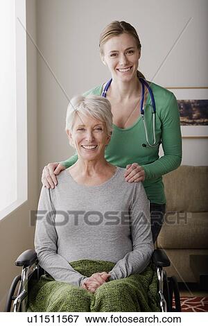 Portrait of young female nurse and senior woman View Large Photo Image Stock Photo - Portrait of young female nurse and senior woman. Fotosearch