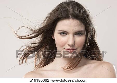Stock Image - Portrait of young woman. Fotosearch