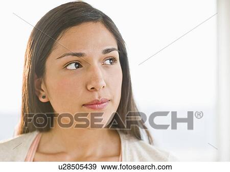 Stock Photo - Portrait of young woman. Fotosearch