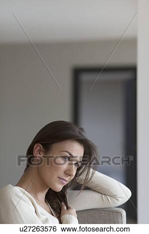 Stock Photograph - Portrait of young woman. Fotosearch
