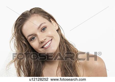 Portrait of young woman with wet hair View Large Photo Image Stock Image - Portrait of young woman with wet hair. Fotosearch