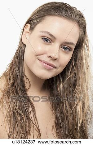 Portrait of young woman with wet hair View Large Photo Image Stock Photo - Portrait of young woman with wet hair. Fotosearch