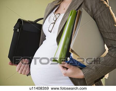 Pregnant business woman View Large Photo Image Stock Photo - Pregnant business woman. Fotosearch