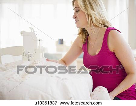 Pregnant woman sewing baby blanket View Large Photo Image Stock Photo - Pregnant woman sewing baby blanket. Fotosearch