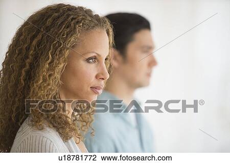 Profile of couple with focus on woman in foreground View Large Photo Image Stock Image - Profile of couple with focus on woman in foreground. Fotosearch