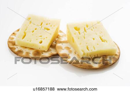 Pyrennes cow cheese with crackers View Large Photo Image Stock Photo - Pyrennes cow cheese with crackers. Fotosearch