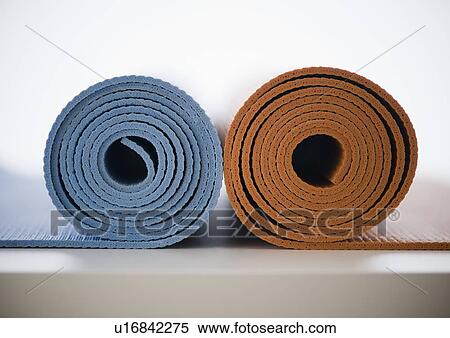 Rolled-up yoga mats View Large Photo Image Stock Photography - Rolled-up yoga mats. Fotosearch