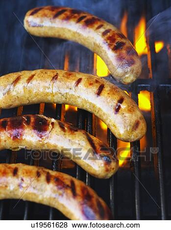 Sausages on bbq View Large Photo Image Stock Photo - Sausages on bbq. Fotosearch