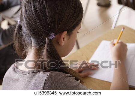 Schoolgirl (12-13) at school View Large Photo Image Stock Photography - Schoolgirl (12-13) at school. Fotosearch