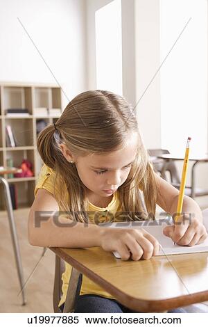 Schoolgirl writing in notebook View Large Photo Image Stock Photography - Schoolgirl writing in notebook. Fotosearch