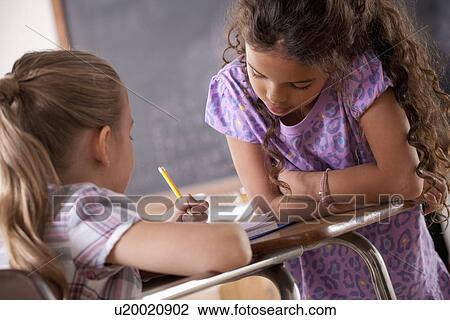 Schoolgirls in classroom View Large Photo Image Stock Image - Schoolgirls in classroom. Fotosearch