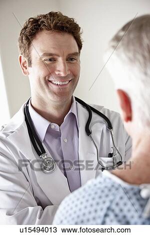 Stock Image - Senior patient and doctor. Fotosearch