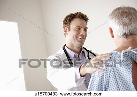 Stock Image - Senior patient and doctor. Fotosearch