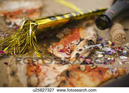 Slices of pizza and confetti in in box View Large Photo Image Stock Photo - Slices of pizza and confetti in in box. Fotosearch