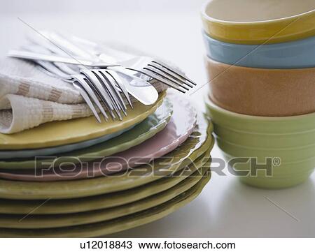 Stack of bowls and plates View Large Photo Image Stock Image - Stack of bowls and plates. Fotosearch