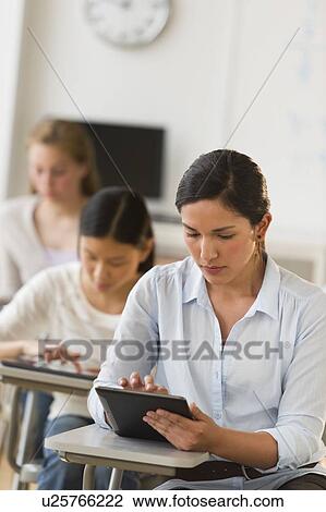 Students (14-19) using digital tablets View Large Photo Image Stock Image - Students (14-19) using digital tablets. Fotosearch