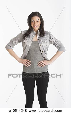 Stock Photo - Studio portrait of young woman. Fotosearch