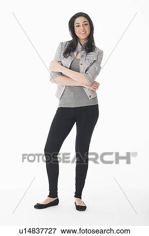 Studio portrait of young woman View Large Photo Image Stock Photo - Studio portrait of young woman. Fotosearch