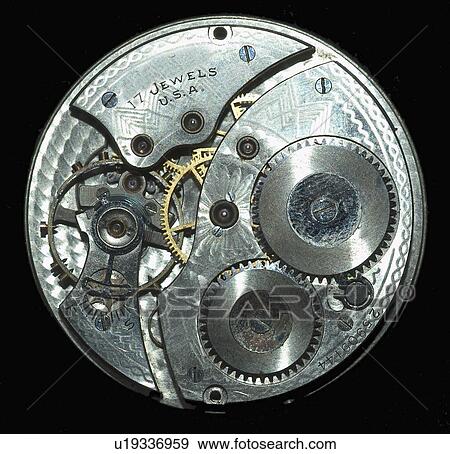 Stock Photo - Studio shot of complex clockwork. Fotosearch
