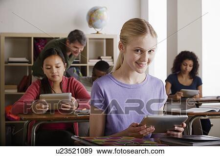 Teacher and teenage students (14-15, 16-17) View Large Photo Image Stock Photo - Teacher and teenage students (14-15, 16-17). Fotosearch