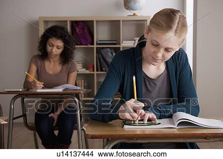 Teenage girls (14-15, 16-17) at school View Large Photo Image Picture - Teenage girls (14-15, 16-17) at school. Fotosearch